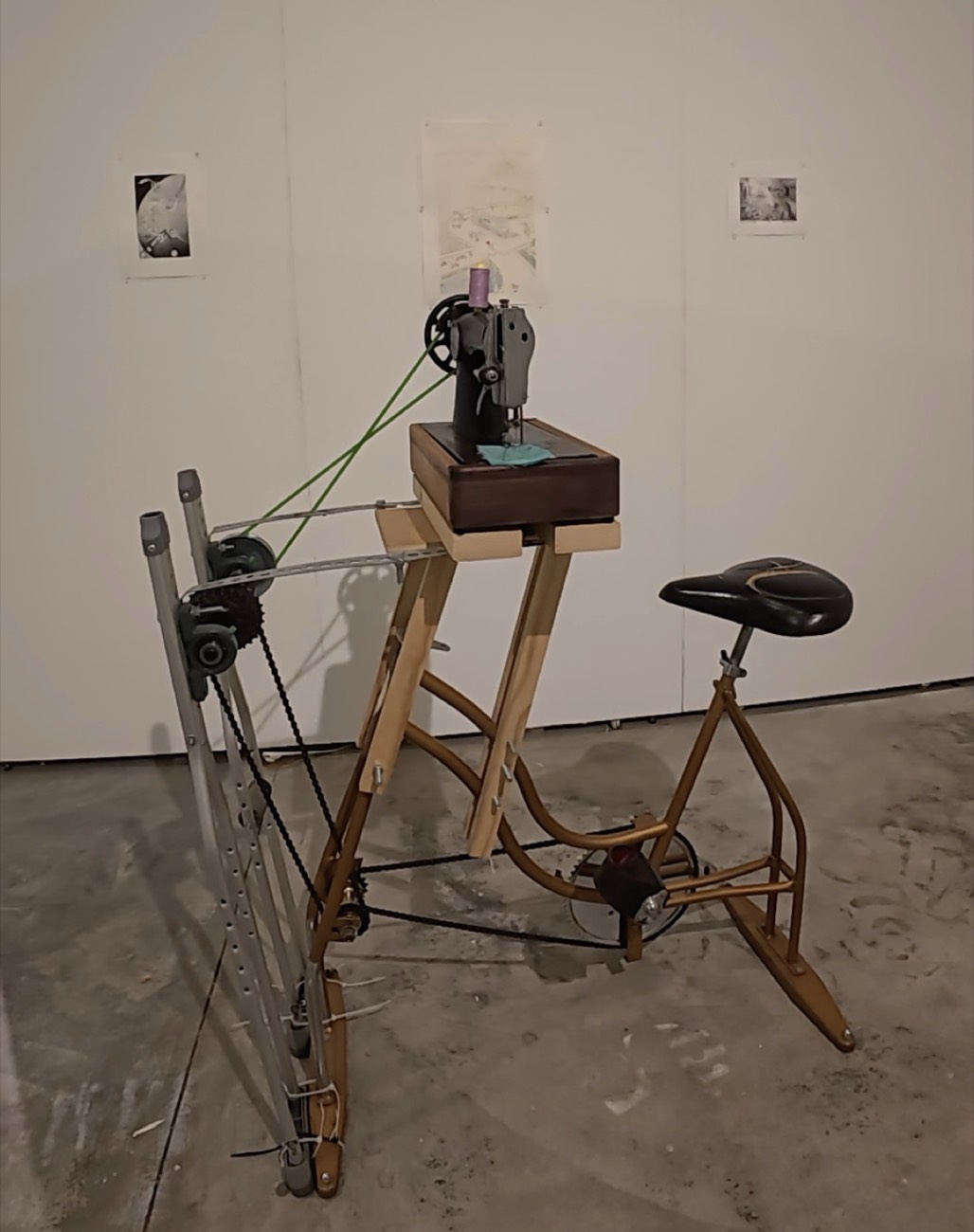 SewCycle: a pedal-powered sewing machine built from a vintage stationary bike frame driving a Singer 15 sewing machine.